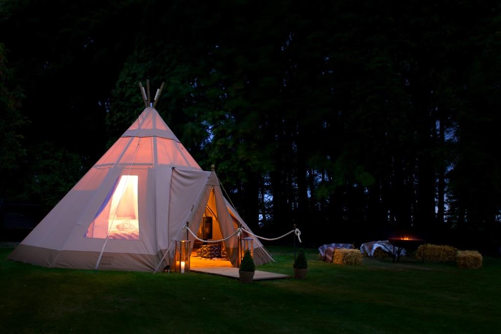 6.5m Baby tipi with porch nighttime shot